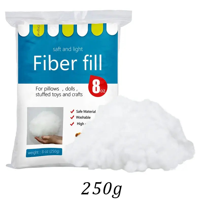 250g KRABALL Fiber Fill bag labeled 'Safe and Light' with soft polyester stuffing. Ideal for dolls, pillows, and plush toys.