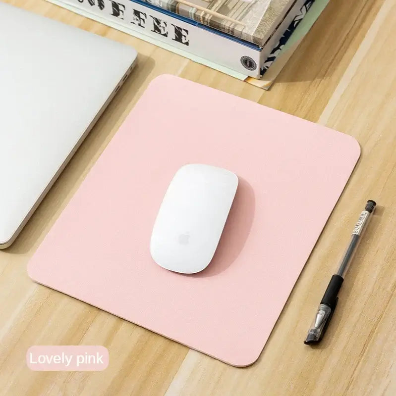 Lovely pink Small PU Leather Gaming Mouse Pad with anti-slip base, perfect for stylish and compact desktop setups.