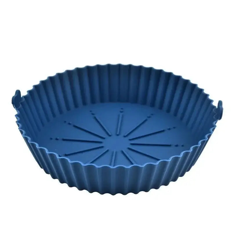 Blue silicone air fryer liners pot with non-stick surface and side handles. Perfect for baking or frying in air fryers.