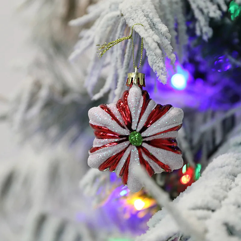 Close-up of a red and white peppermint-style ornament from the Christmas Tree Ornaments Set - 6pcs Red Star Candy, hanging on a snowy branch.