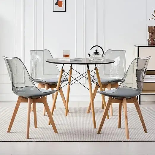Gray transparent 5-piece round dining table set with clear chairs and wooden legs, adding a modern touch to small dining spaces.