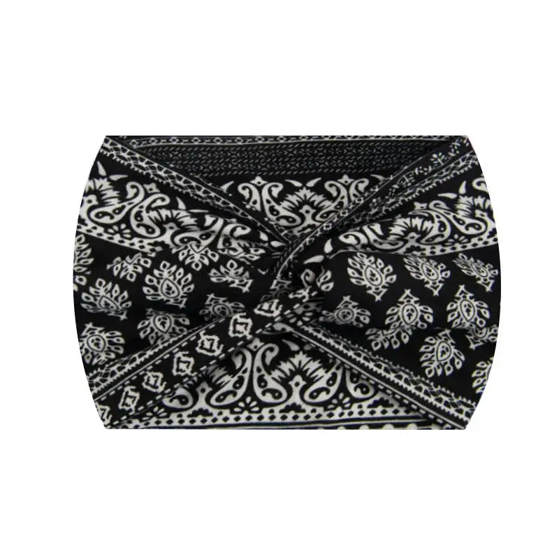 Black and white ethnic pattern 18CM stretch printed headband. Comfortable and stylish for everyday or athletic wear.
