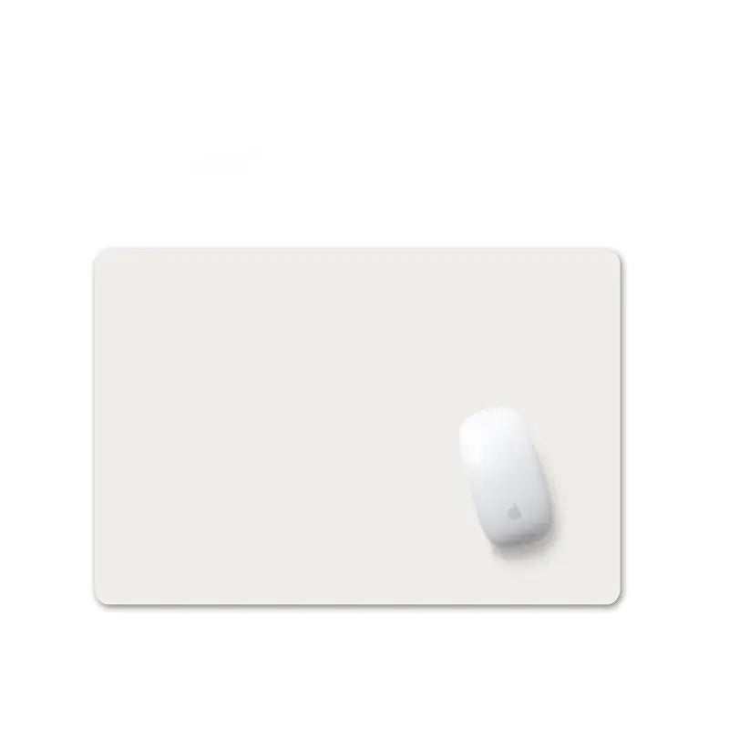 White Small PU Leather Gaming Mouse Pad with non-slip backing, compact and sleek for modern desktop setups.