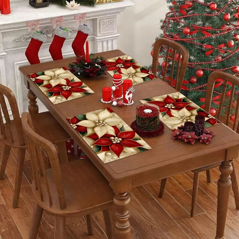 Elegant poinsettia Linen Christmas Placemats on a festive dining table near a decorated Christmas tree. Perfect for holiday gatherings.