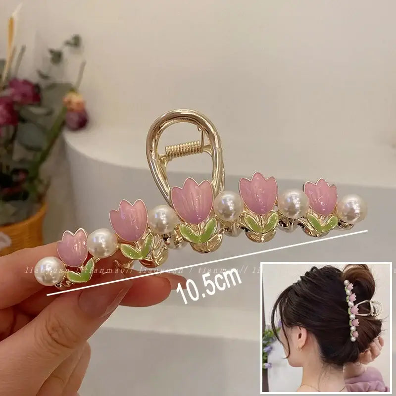 Pink tulip ponytail hair clip with pearl accents, 10.5cm long, perfect for secure and feminine updos.