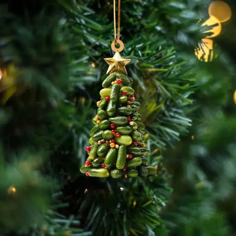 Christmas tree ornament made of miniature green pickles with red accents, a quirky twist on traditional holiday decor.