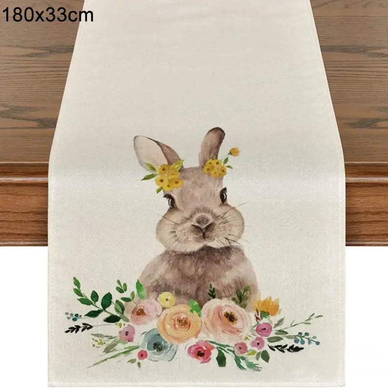 Linen Easter Bunny Table Runner with cute bunny and floral crown design. 180x33cm runner adds charm to spring and Easter tables.