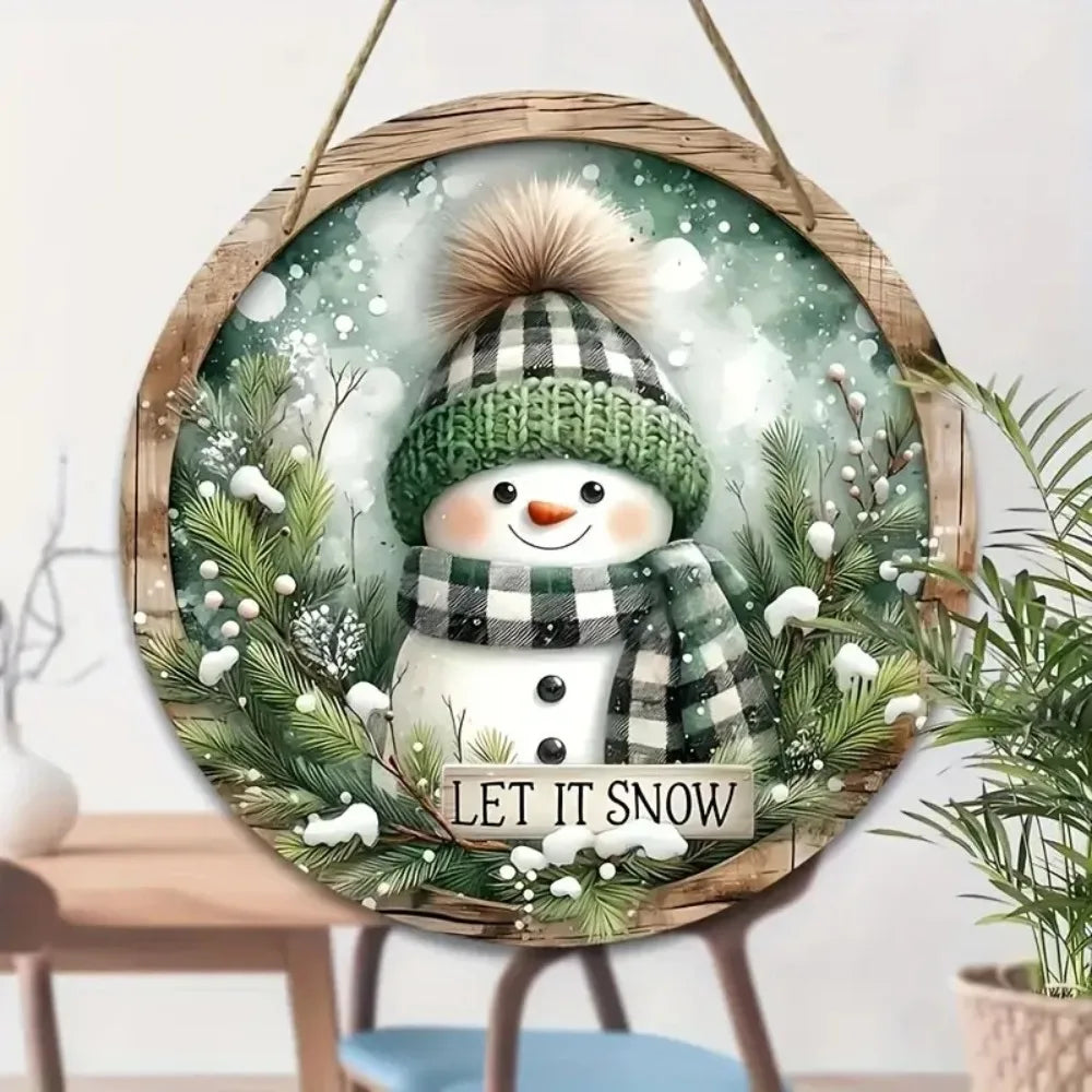 Snowman Sign - Wooden Circular Art | 20x20cm Design features a smiling snowman in green winter attire with 'Let It Snow' text, perfect for holiday decor.