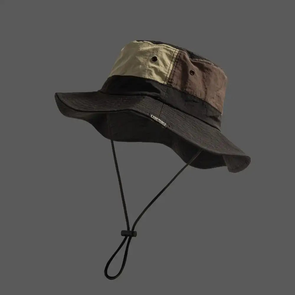 Black and brown Sun Protection Bucket Hat - Quick-dry with breathable eyelets and chin strap. Foldable and sun-protective design.