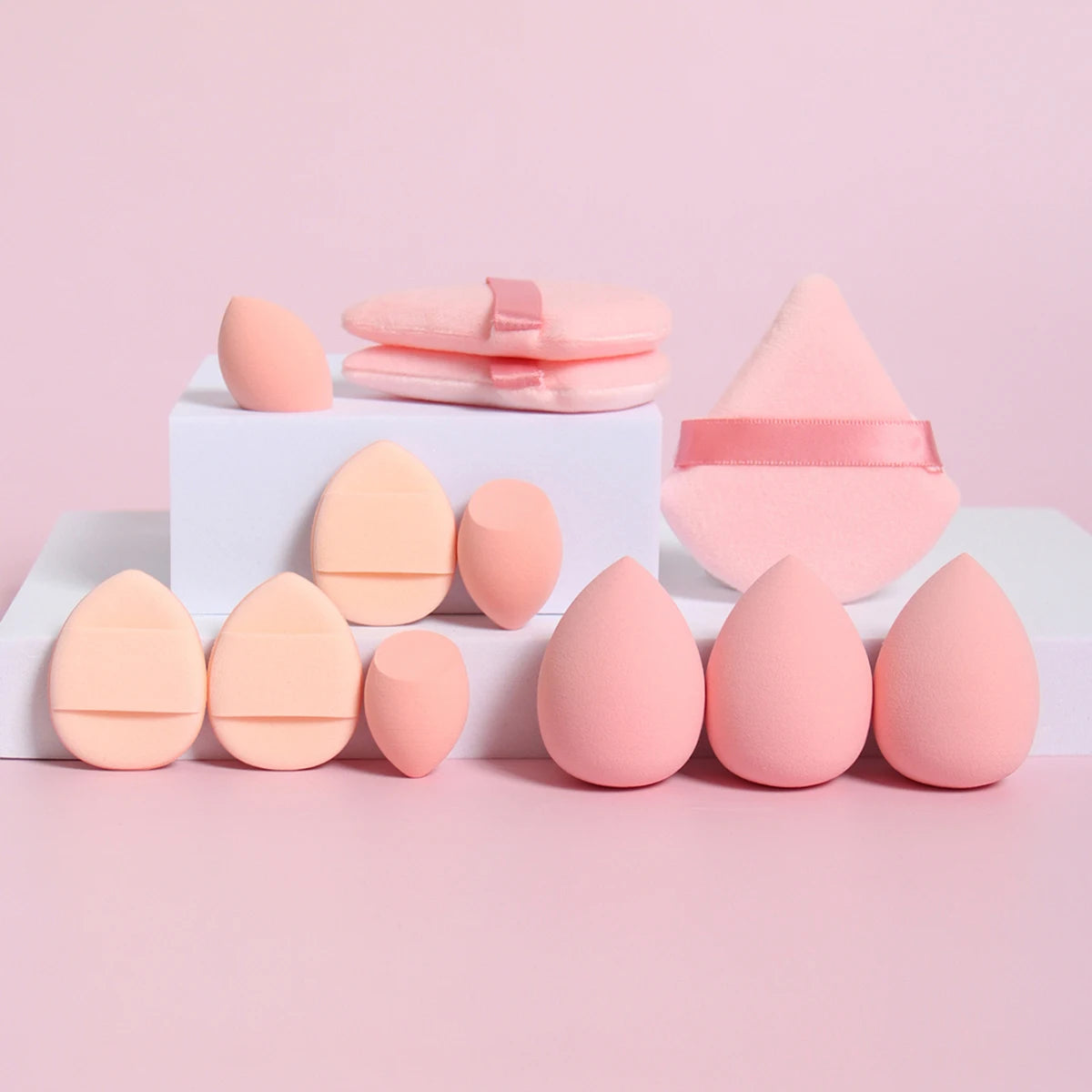 Peach 12-piece makeup sponge set with soft-touch puffs and sponges. Designed for seamless blending and even makeup coverage.