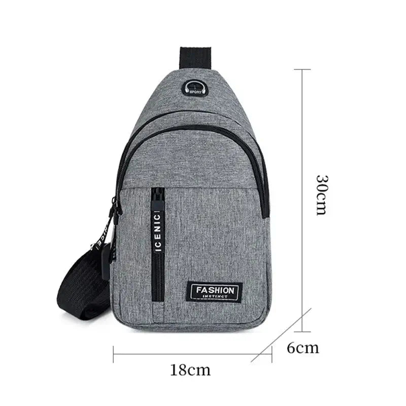 Gray crossbody shoulder bag with dimensions 30x18x6 cm, featuring a compact design and front zipper pocket for organized storage.