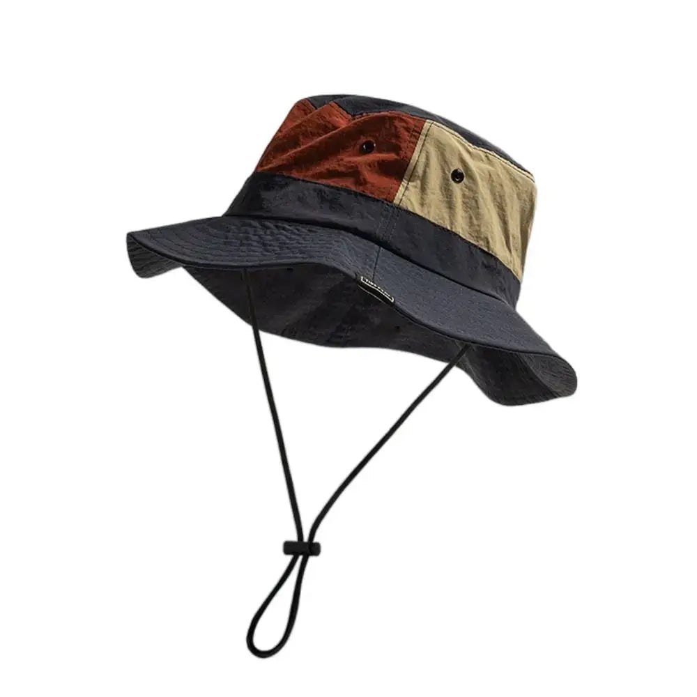 Navy and red Sun Protection Bucket Hat - Quick-dry with beige panel and chin strap. Ideal for sun protection during outdoor activities.