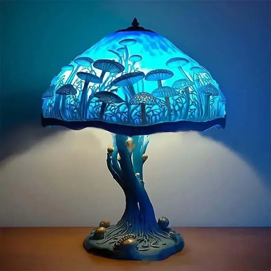 Blue stained glass table lamp with mushroom design from the Stained Plant Series. Resin base shaped like a tree trunk for cozy indoor lighting.