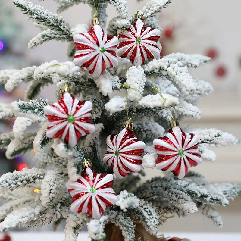 Christmas Tree Ornaments Set - 6pcs Red Star Candy displayed on a snow-covered tree. Features glittery red and white peppermint-style designs.