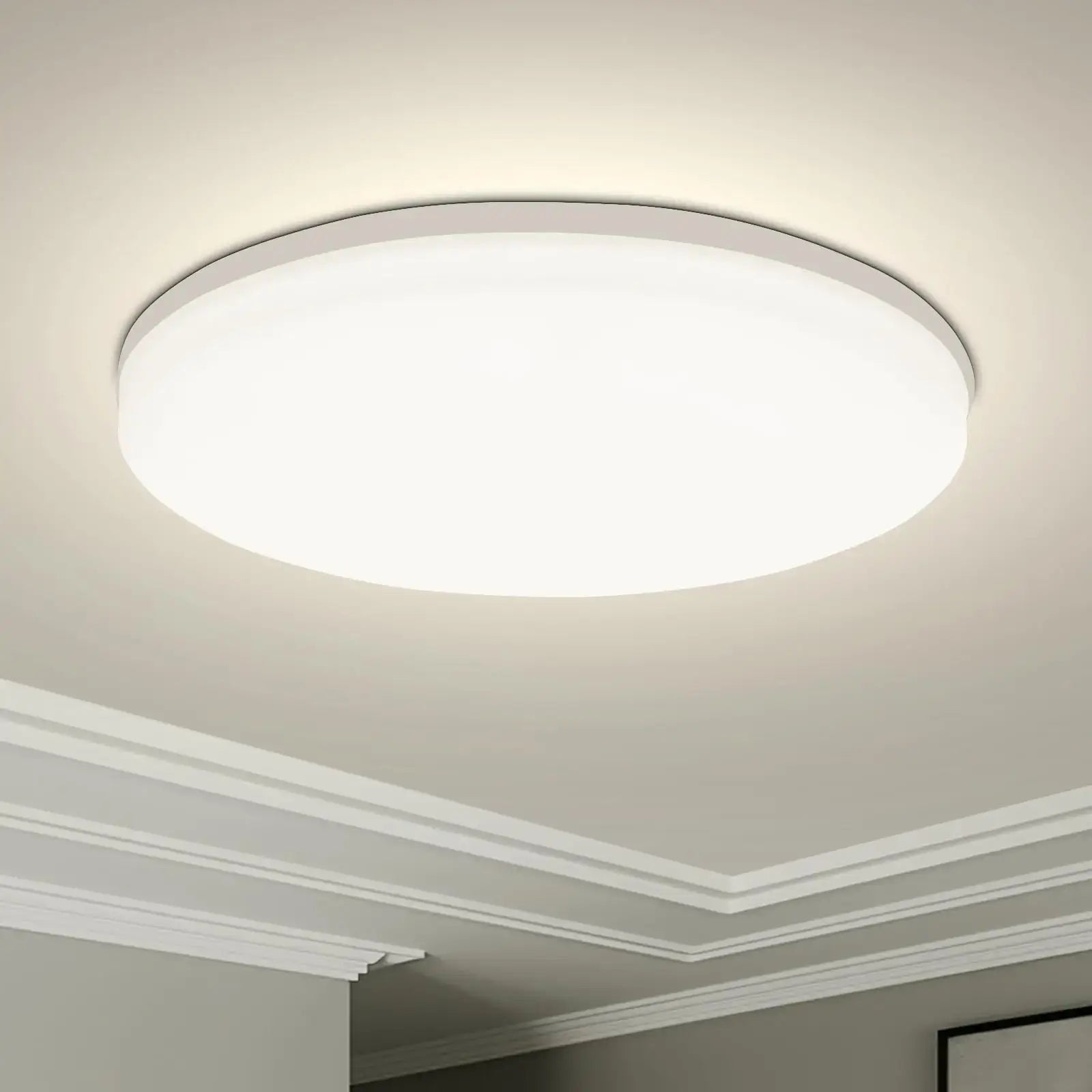 Minimalist Round LED Ceiling Light with soft white glow. Flush-mounted design ideal for modern home ceilings and energy efficiency.